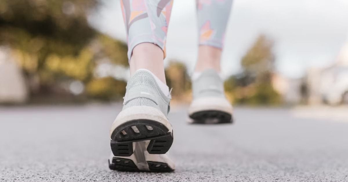 Person Walking down the road