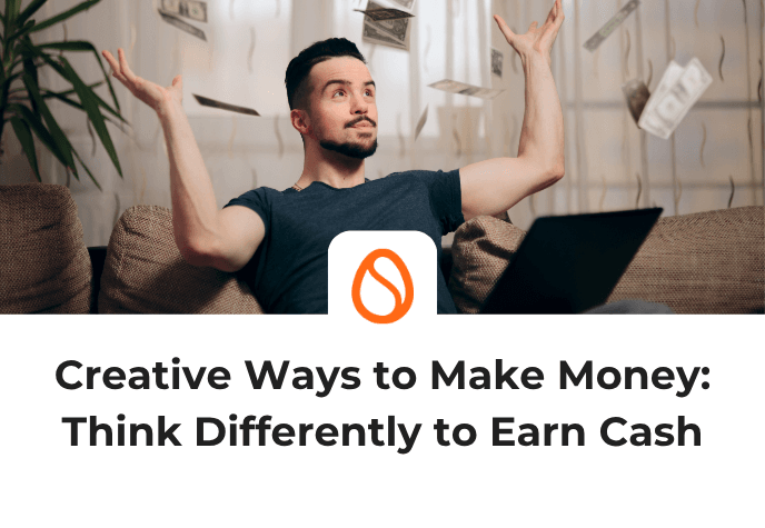 Title text is at the bottom, in black against a white background: "Creative ways to make money: Think differently to make cash". On top of it is the Scrambly orange egg icon, with the photo of a man holding his arms up with a black laptop in his lap as money falls from the sky.